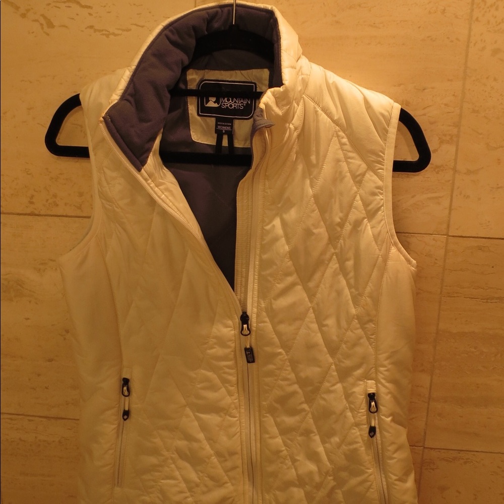 White sporty vest.